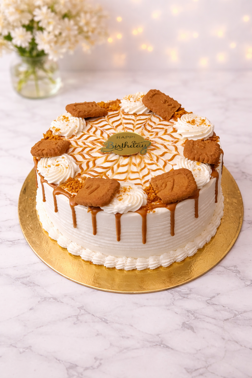 Lotus Biscoff cake with whipped cream and cheese frosting